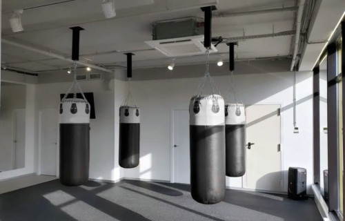 Mounting consoles for boxing equipment and accessories